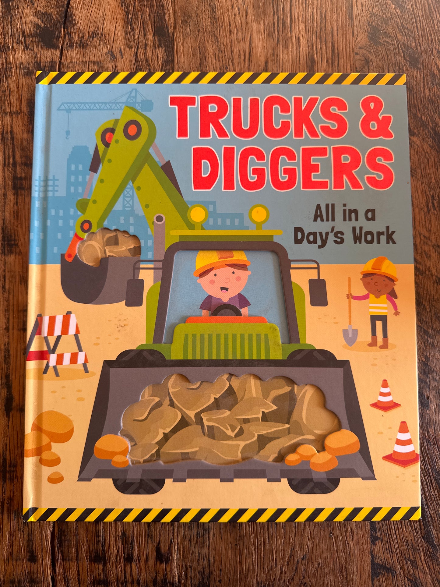 Trucks & Diggers - Peek Through Picture Book by Lake Press